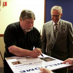 Woz signing poster